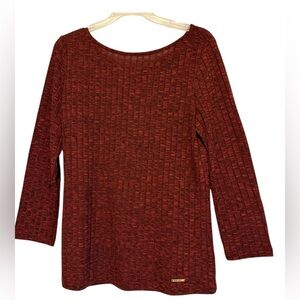 Nine West burgundy and black long sleeve blouse that open in back at neck.